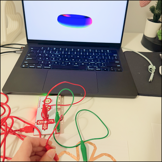 Testing the makey makey with conductive tape on card stock which is not conductive