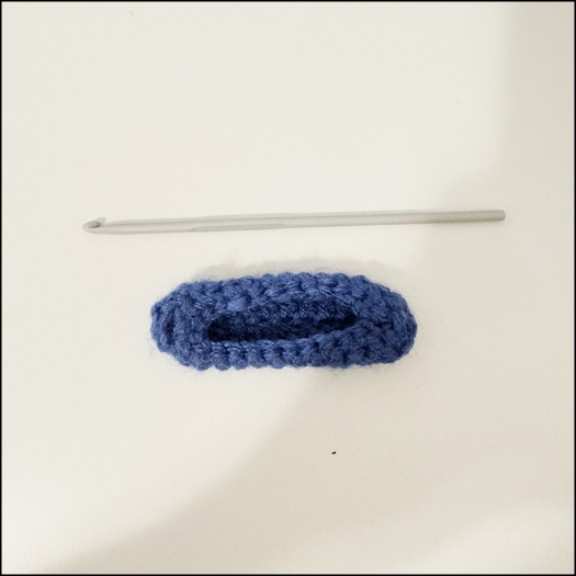 Finished petal shape, there is a third layer with tighter crochet pattern of single crochets to create a barrier which lets the conductive fabric stay inside.